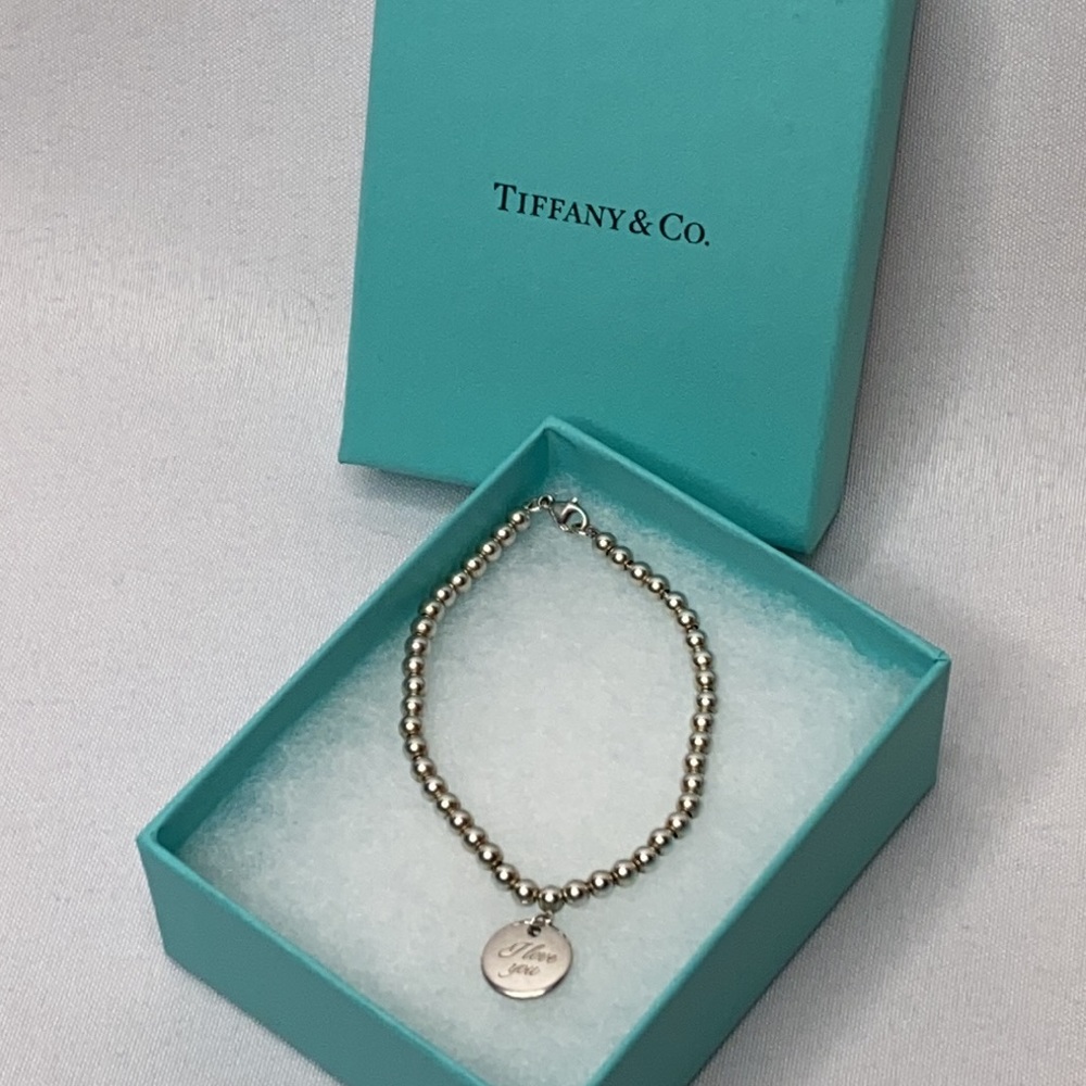 Tiffany & Co " I Love You" bracelet.